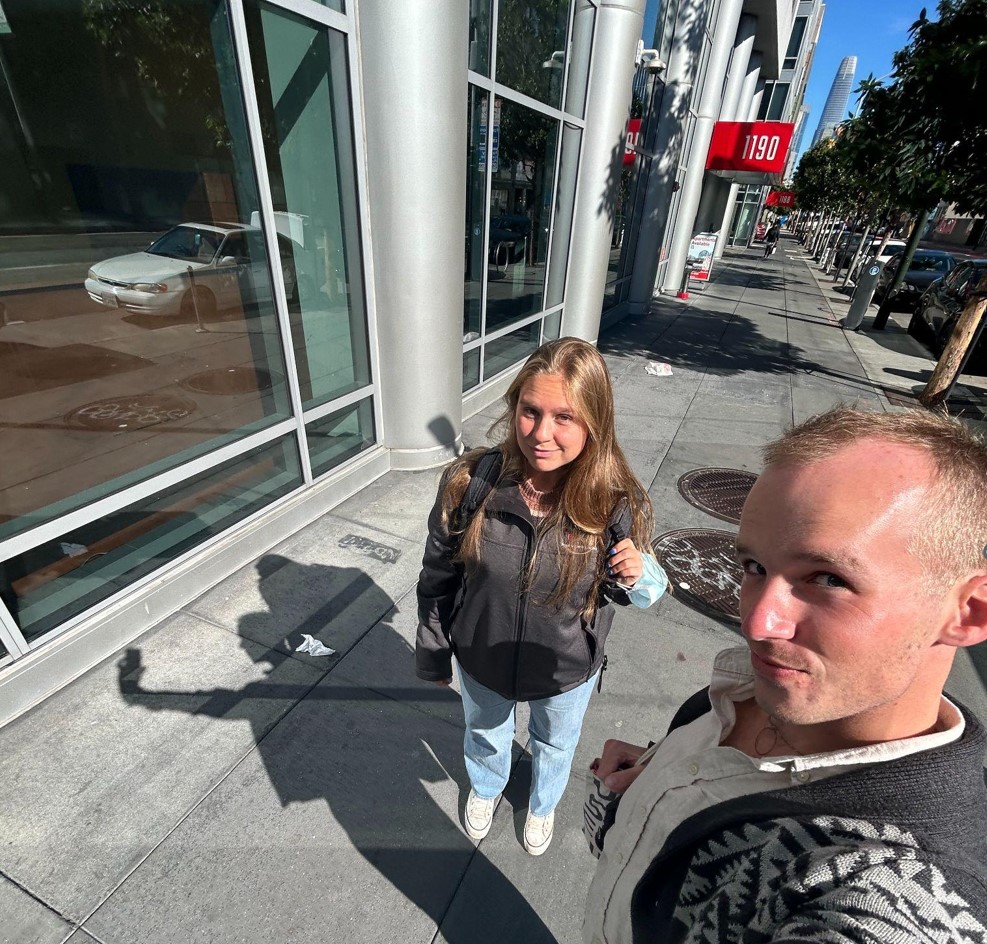 Hannah and fellow AmeriCorps member, John, taking a selfie together in the middle of the service day.